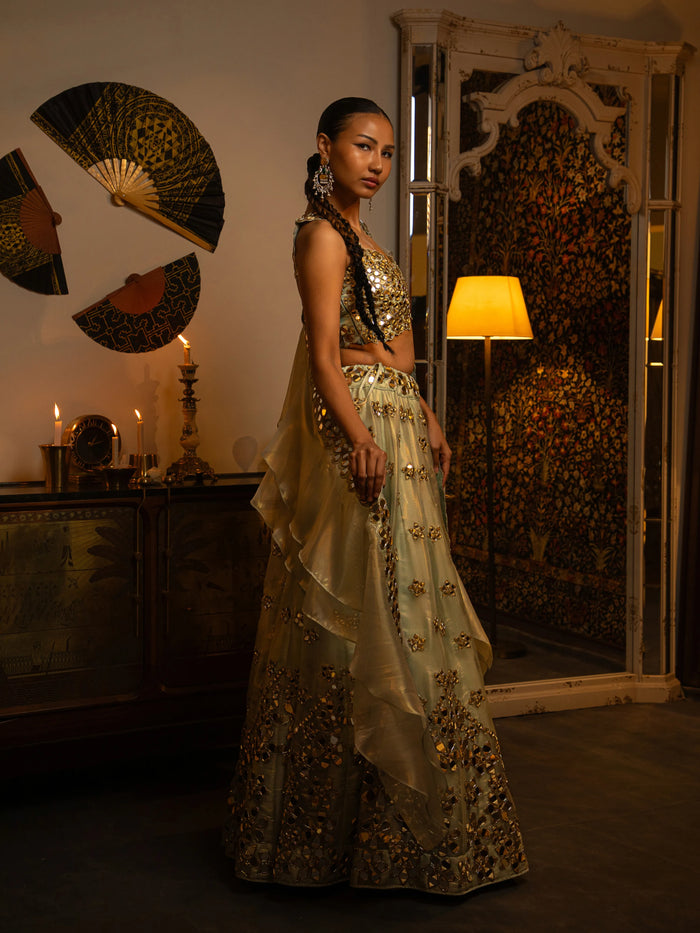 Ocean blue mirror work lehenga.