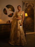 Ivory raw silk mirror work lehenga.