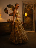 Ivory raw silk mirror work lehenga.