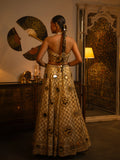 Ivory raw silk mirror work lehenga.