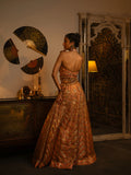 Peach-pink pink zardozi lehenga.