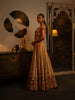 Ivory mirror and thread work lehenga.
