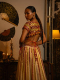 Ivory mirror and thread work lehenga.