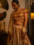 Ivory mirror and thread work lehenga.