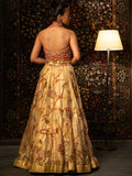 Gold metal and bead work lehenga.