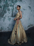 Beige mirror and zardozi lehenga.