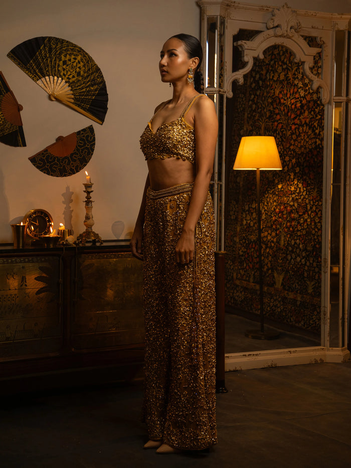 Gold net sharara with sequin work